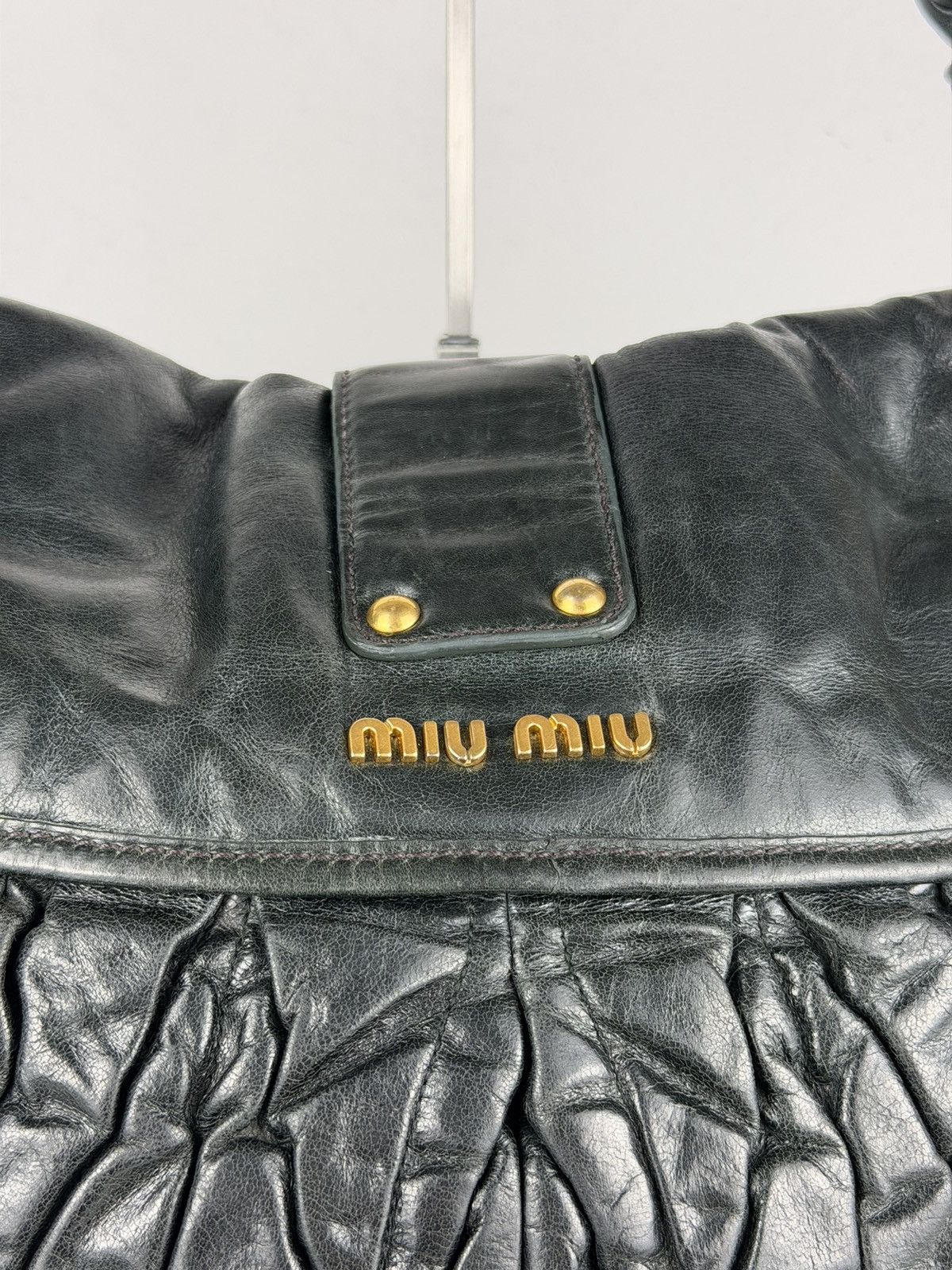 Miu Miu matelasse pleated leather coffer bag in deep green