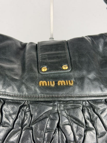 Miu Miu matelasse pleated leather coffer bag in deep green