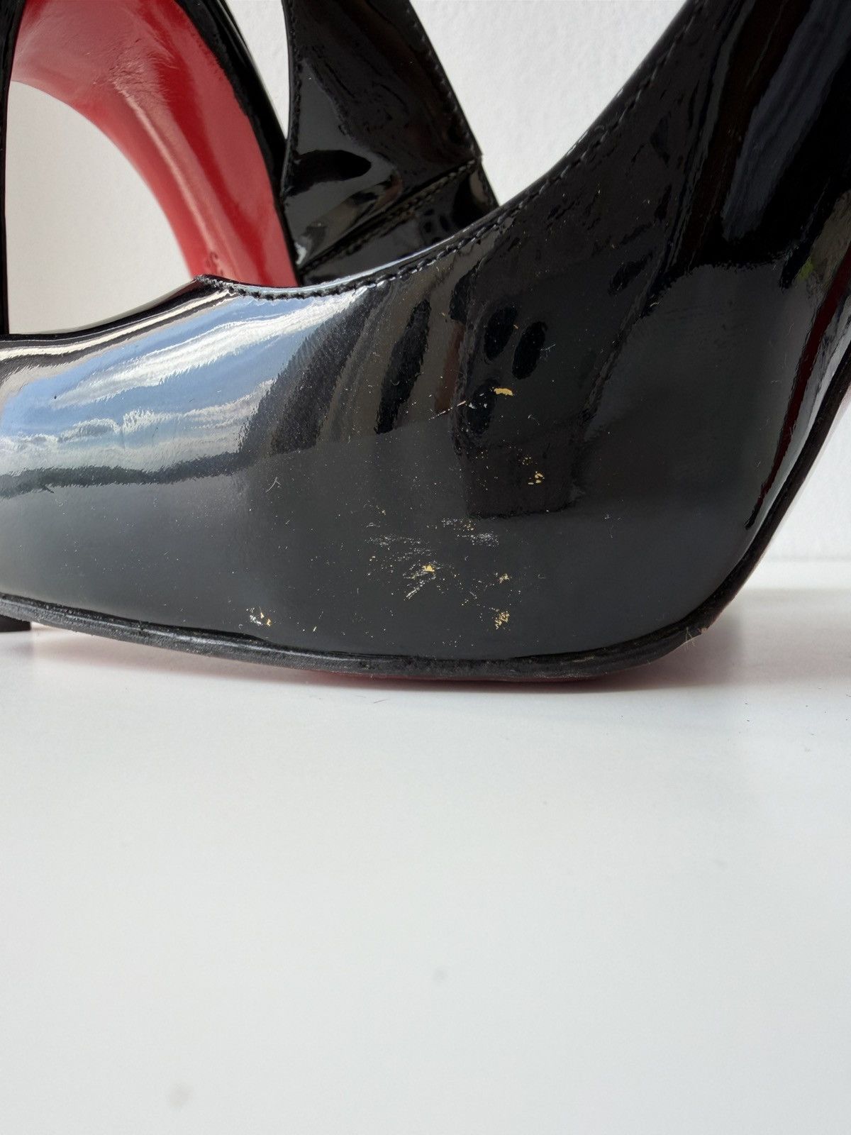 Christian Louboutin Rolande patent leather slingback pumps