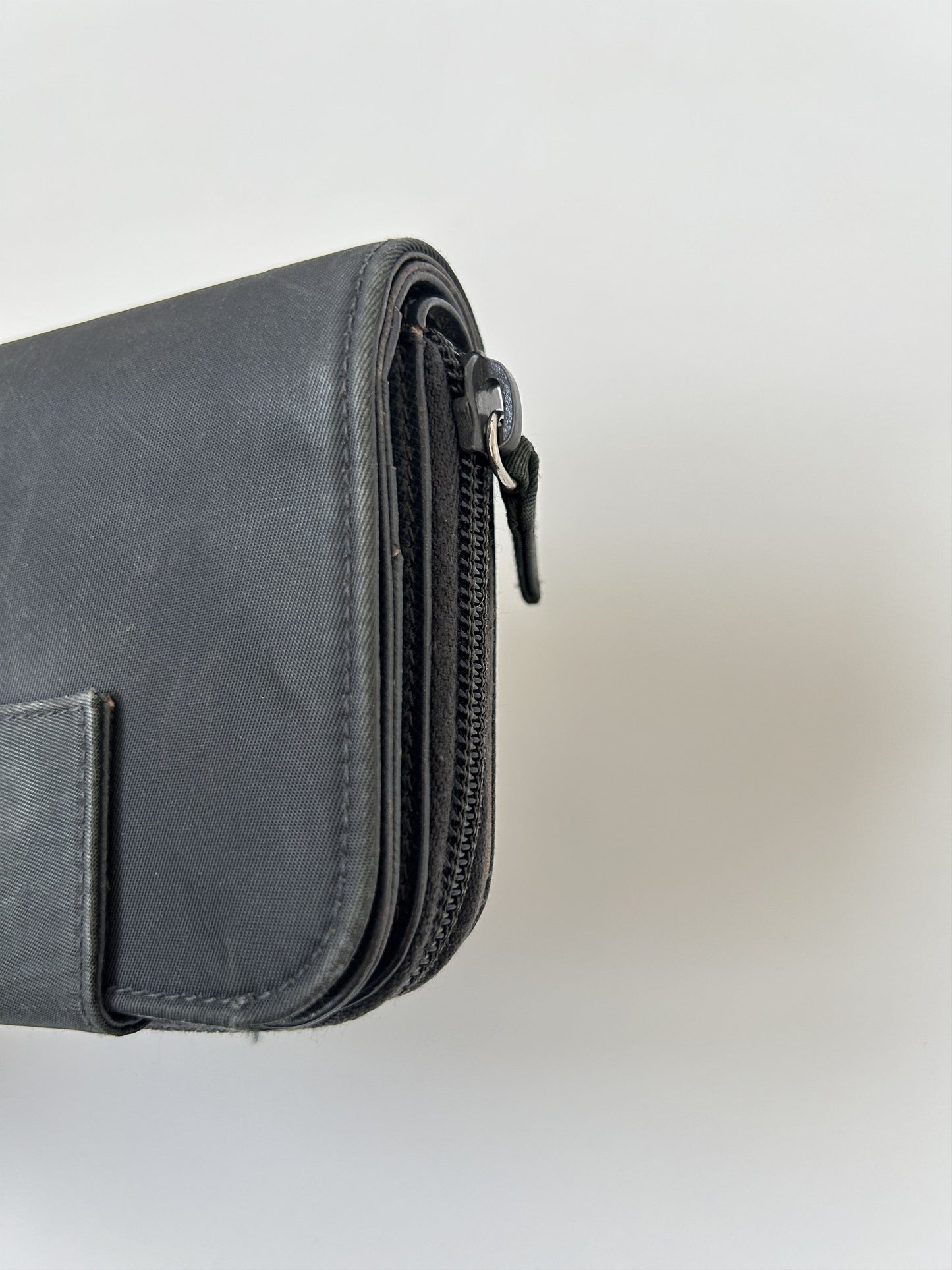 Prada nylon and saffiano leather triangle logo zip wallet