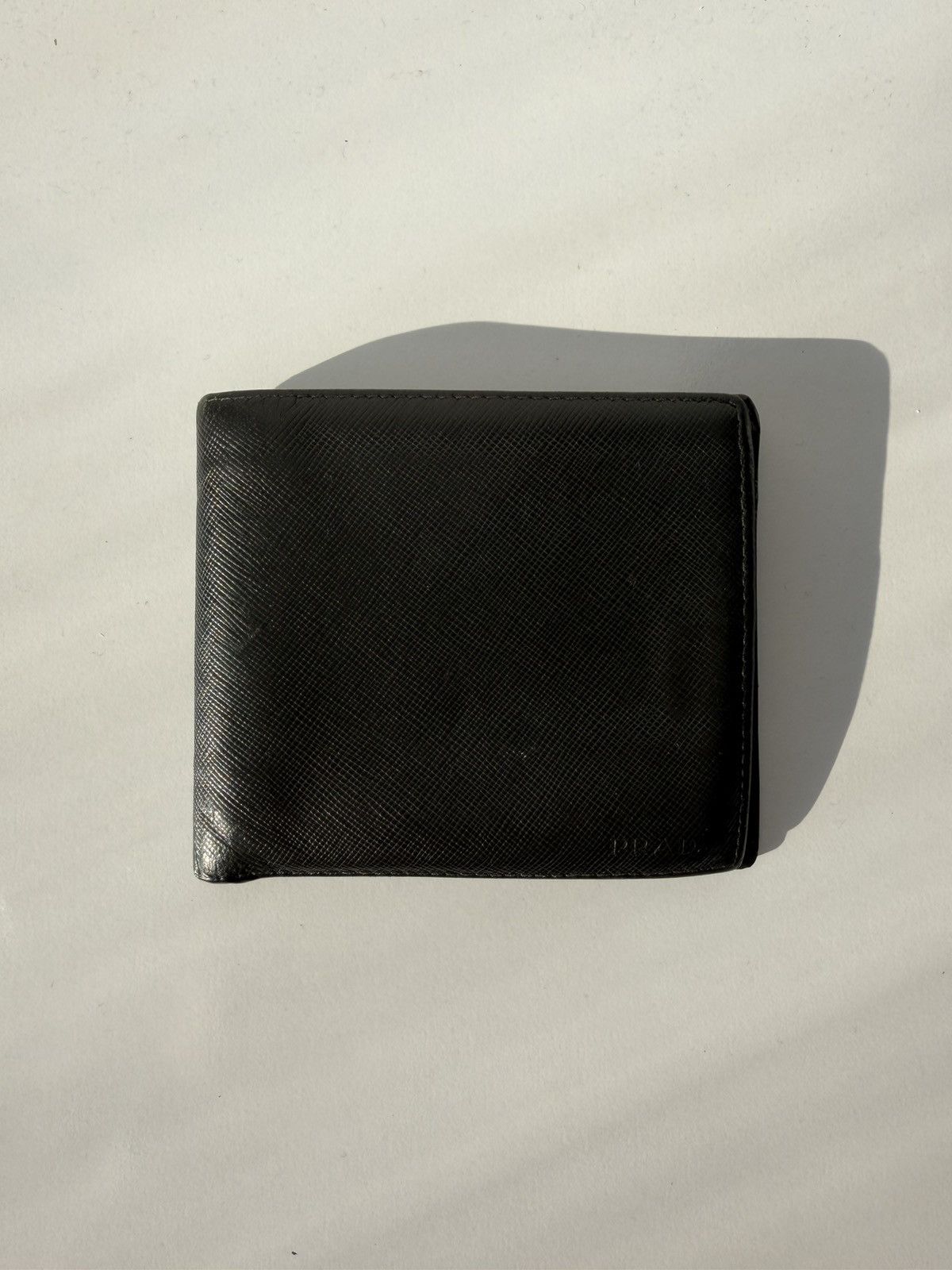Prada saffiano leather bifold wallet