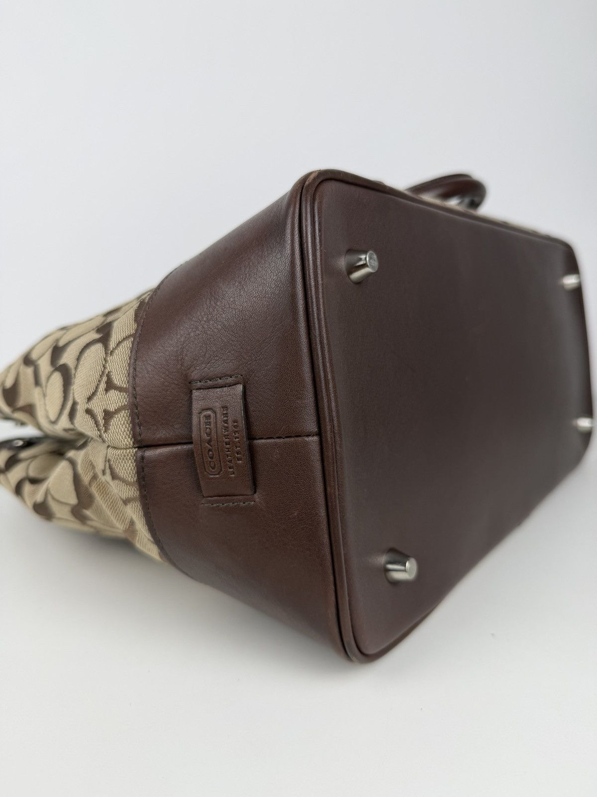 Coach signature leather and canvas tote bag