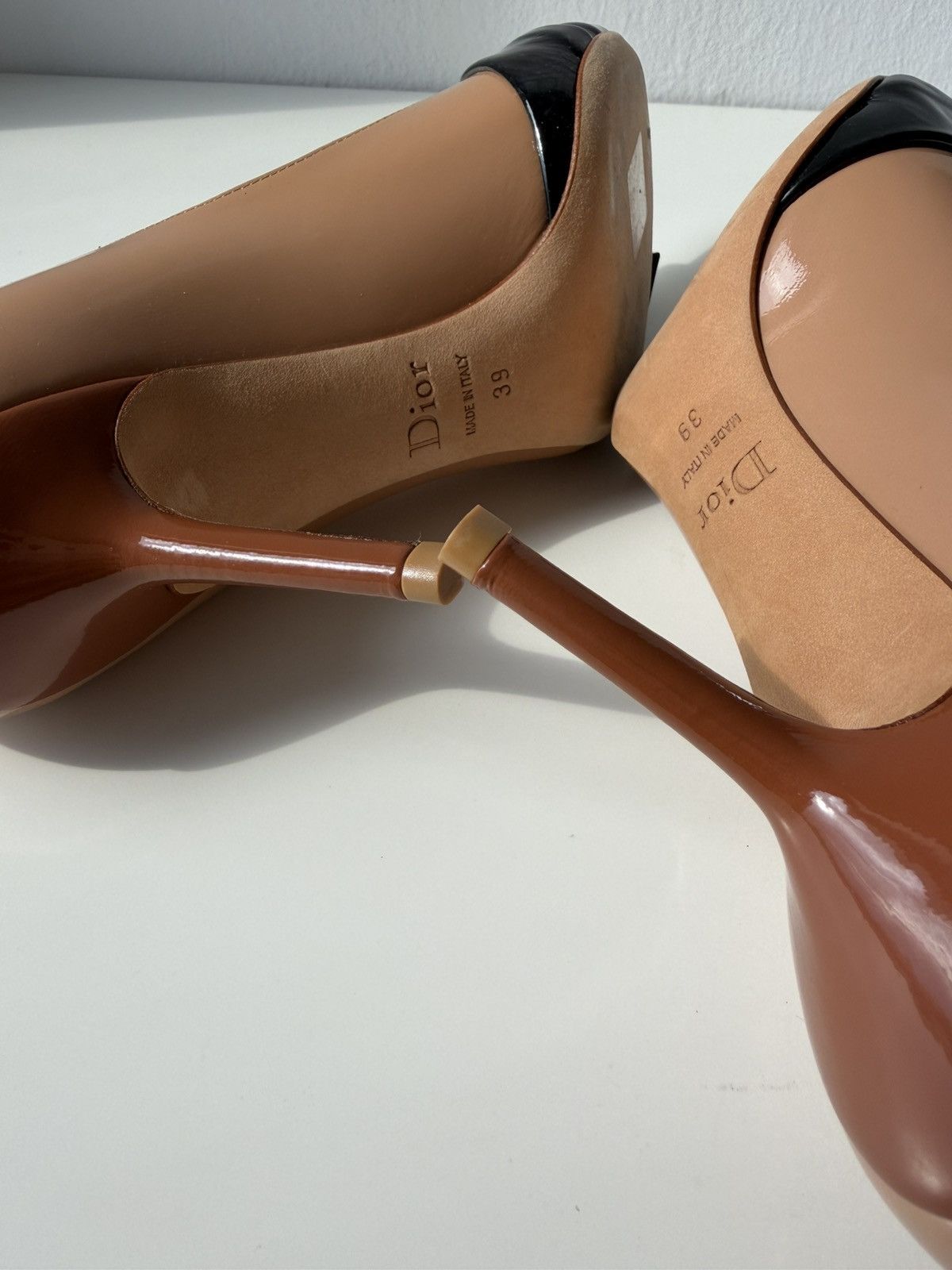 Dior patent leather buckled pointed toe pumps with bow