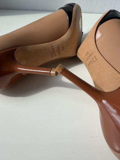 Dior patent leather buckled pointed toe pumps with bow