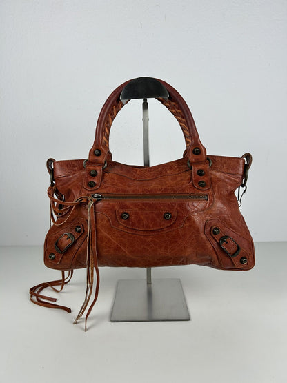 Balenciaga first bag in burnt red