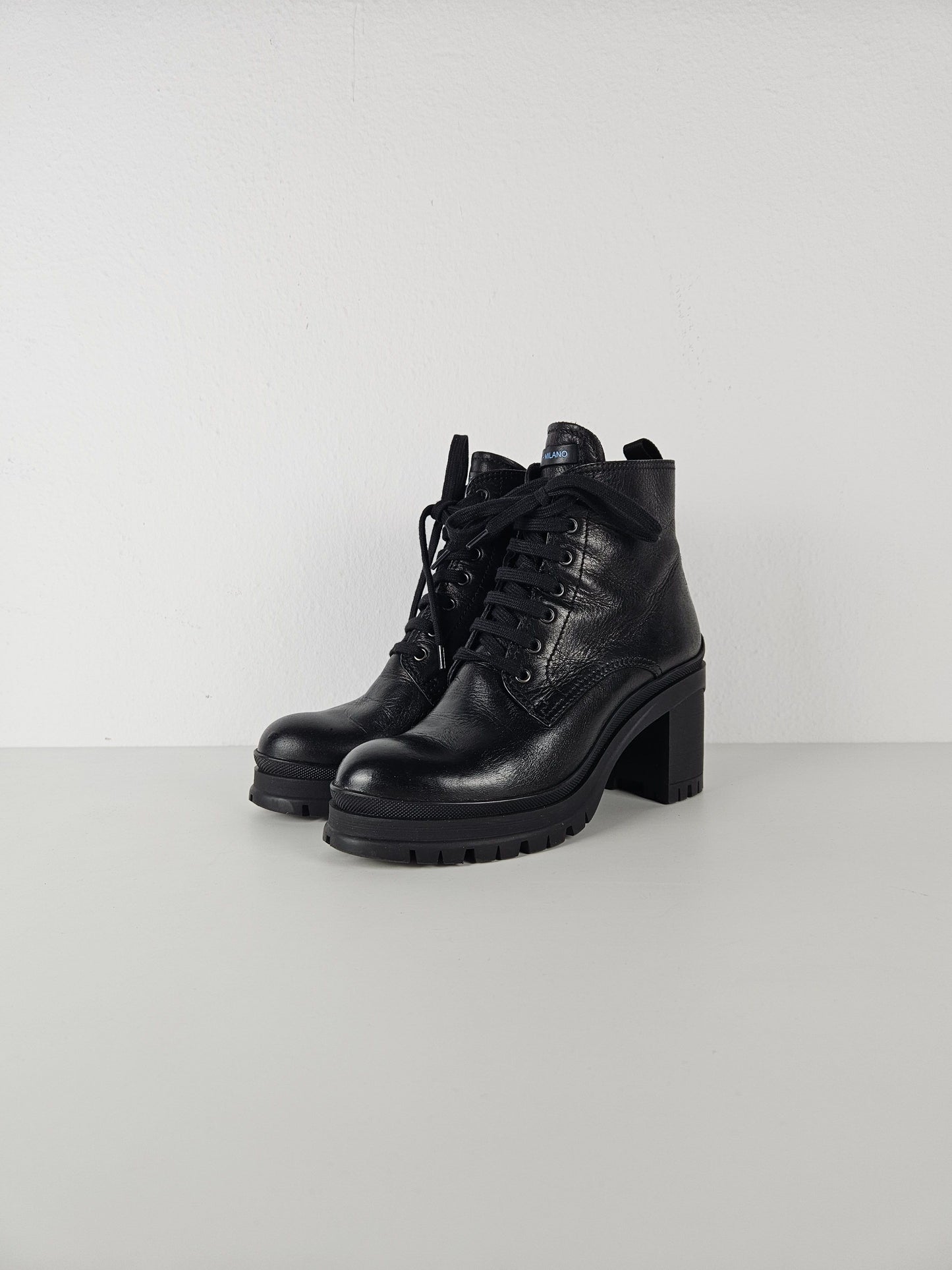 Prada lace up block heel notched sole ankle boots