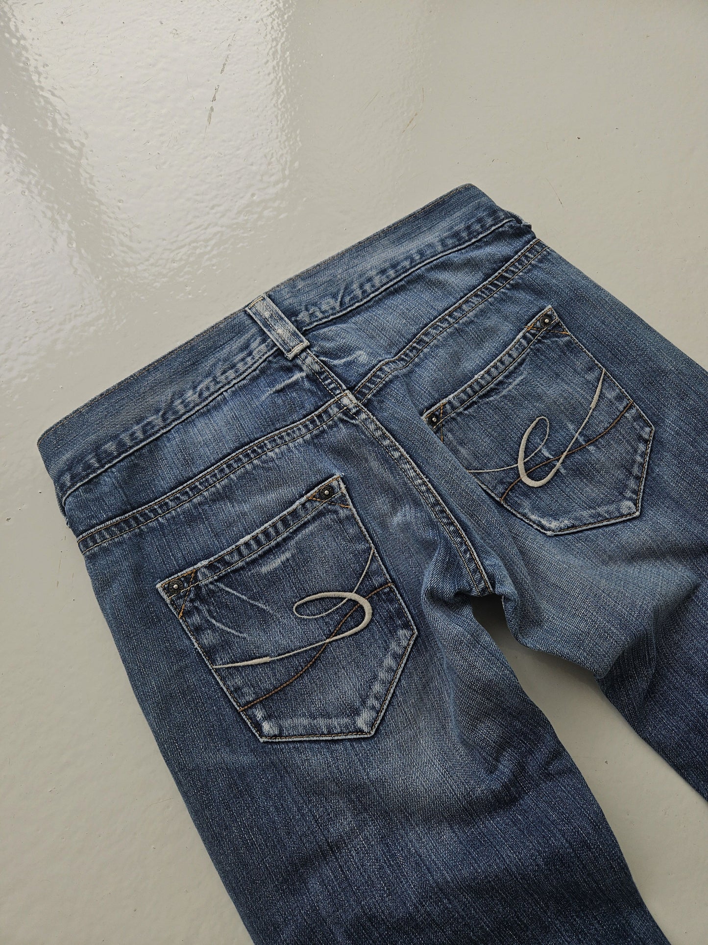 Vintage distressed bootcut low waisted denim
