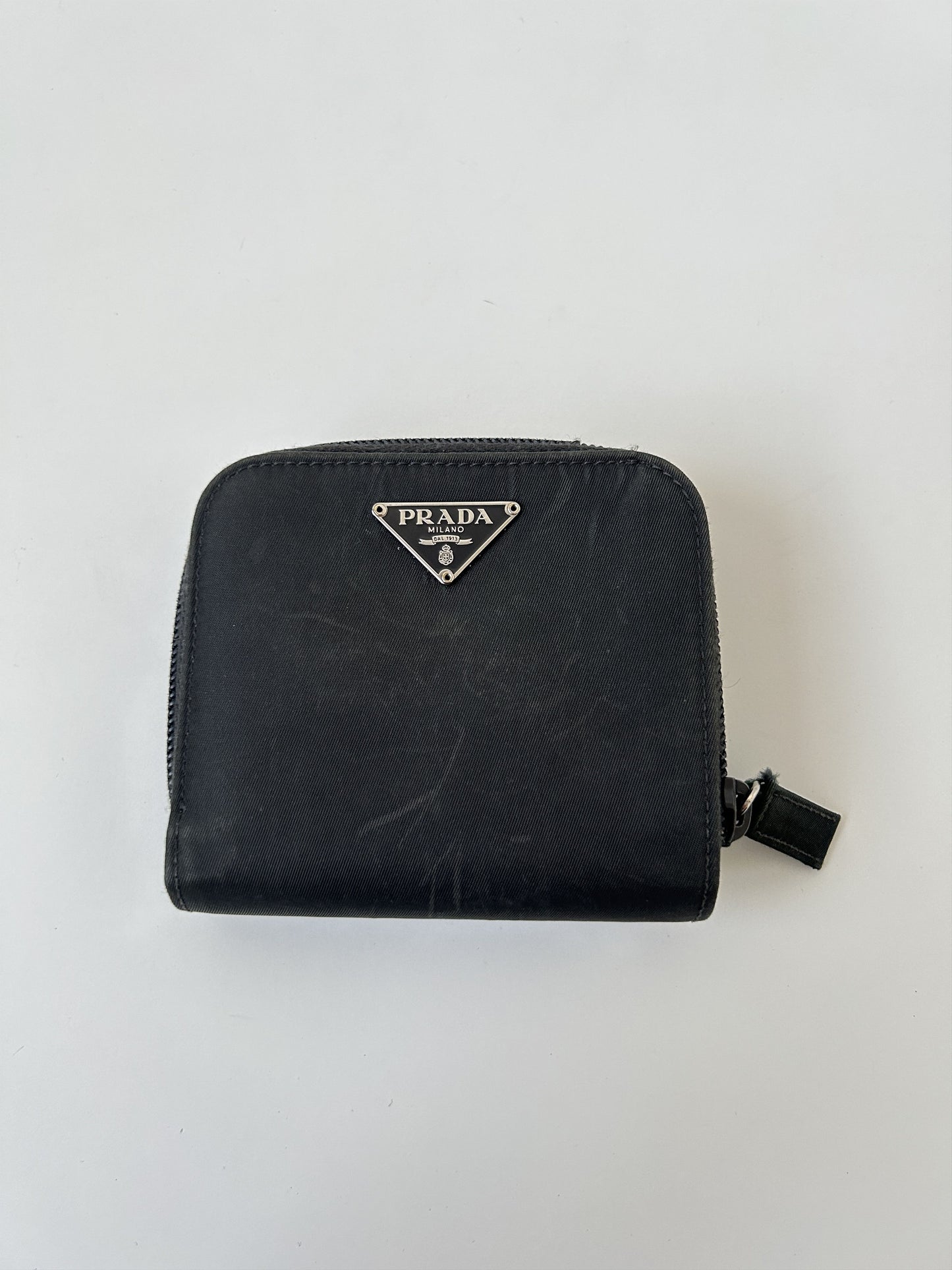 Prada nylon and saffiano leather triangle logo zip wallet
