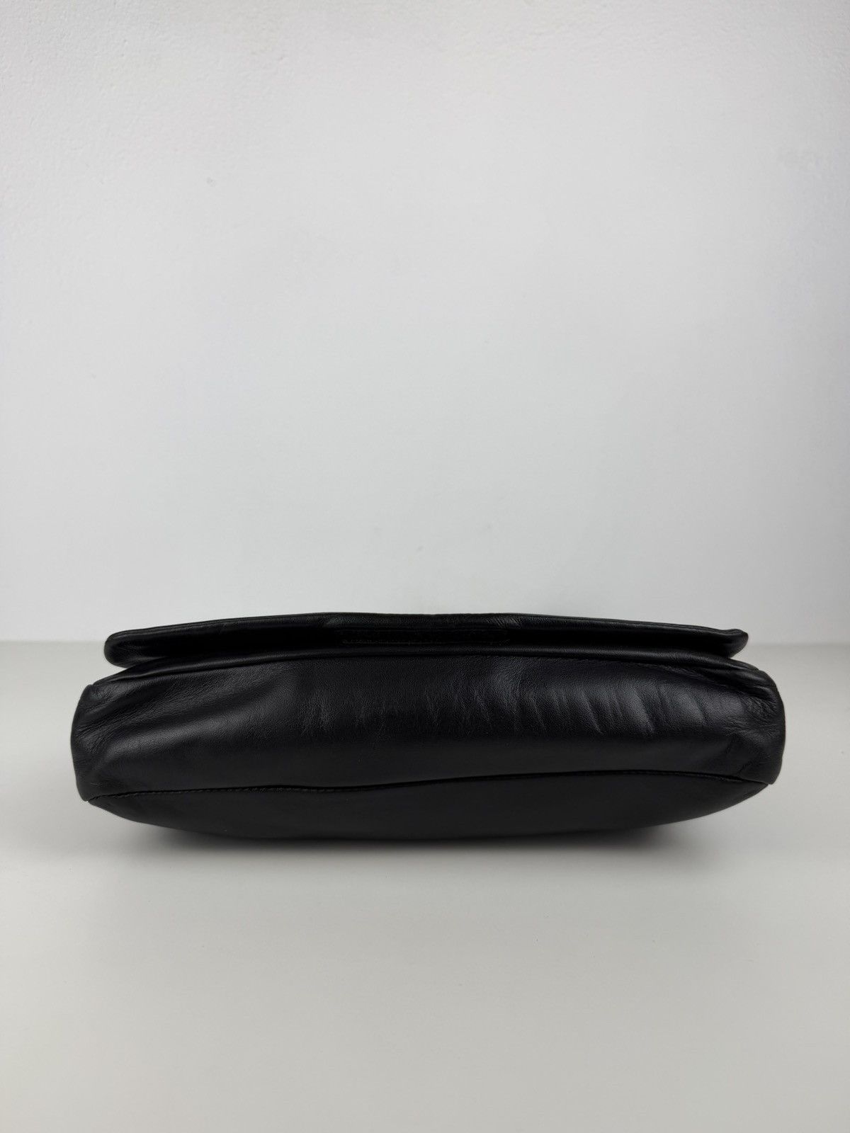 Vintage Prada embossed logo leather shoulder bag