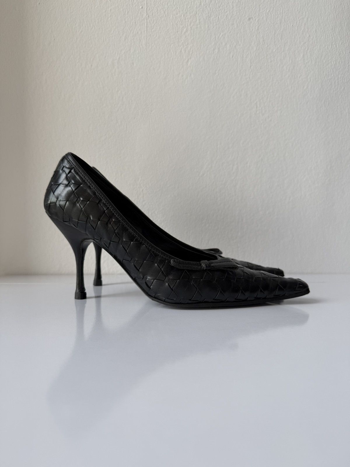 Prada woven leather long toe pumps with bow