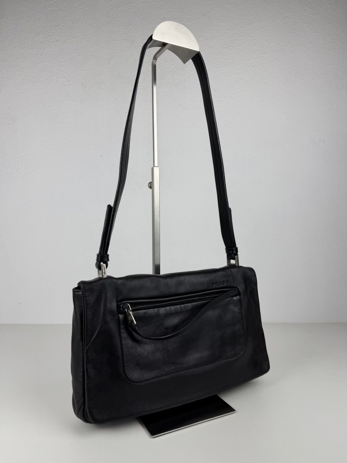 Vintage Prada embossed logo leather shoulder bag