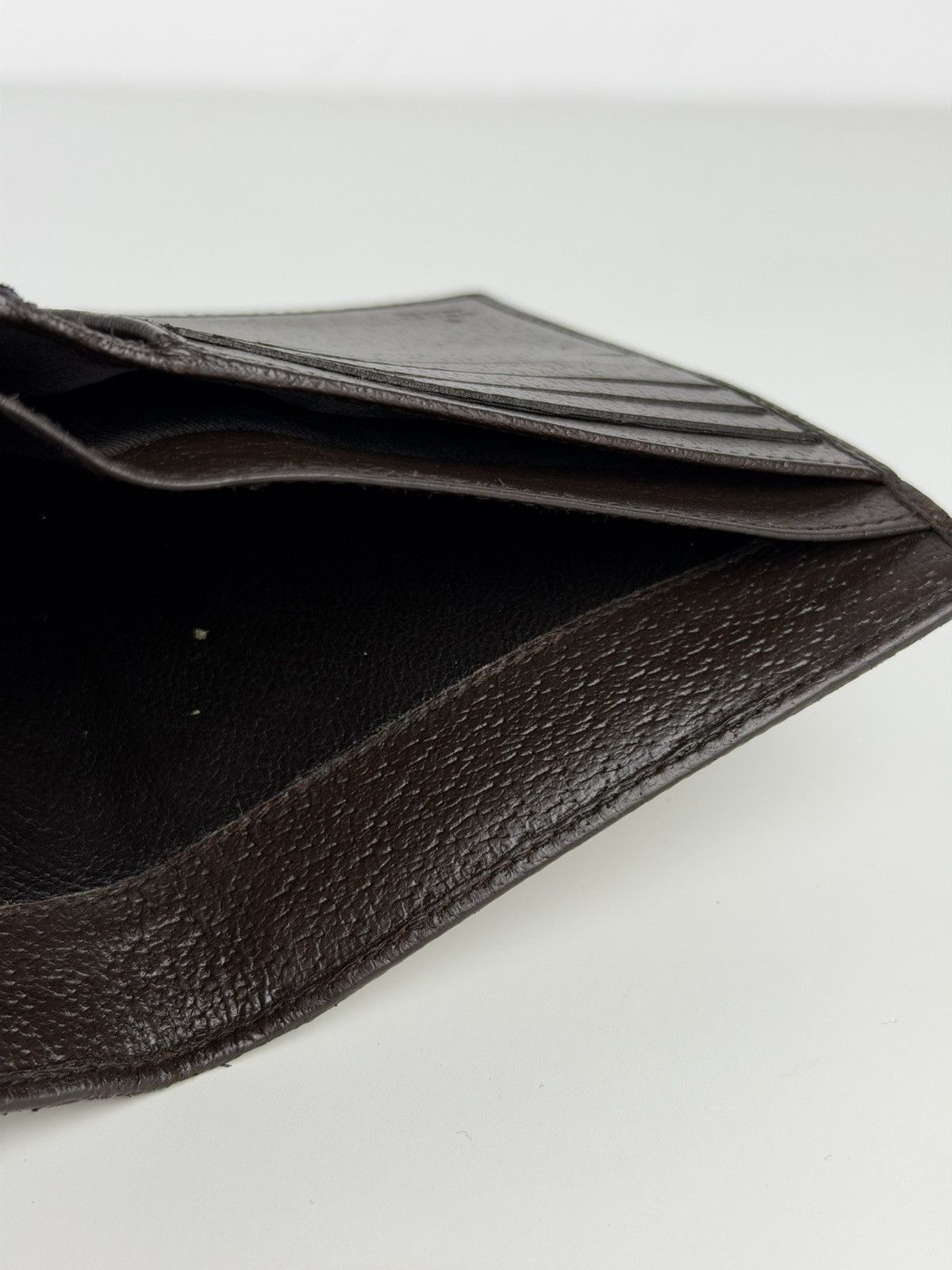 Gucci GG monogram canvas trifold wallet