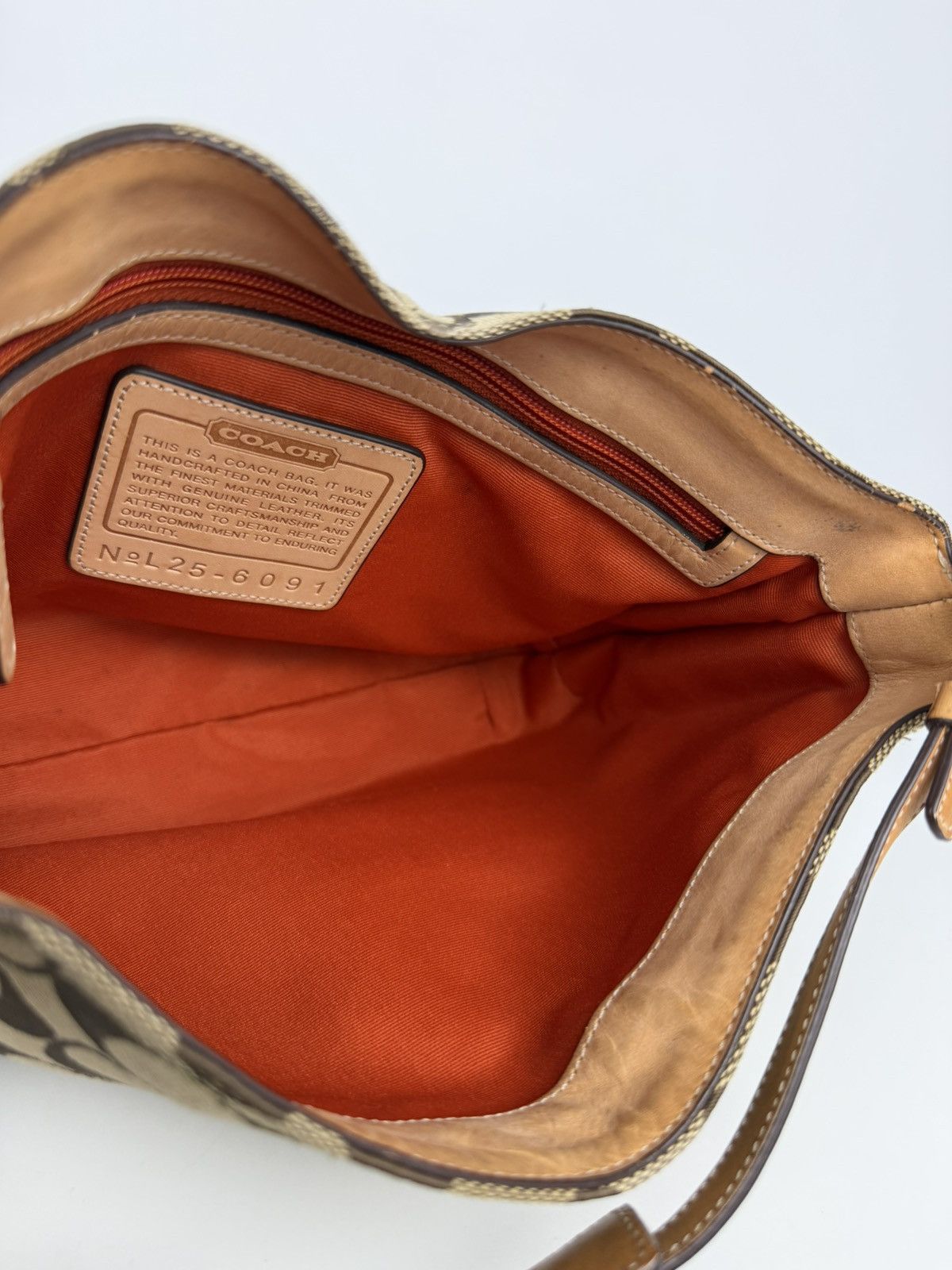 Coach hamptons leather and canvas clasp shoulder bag