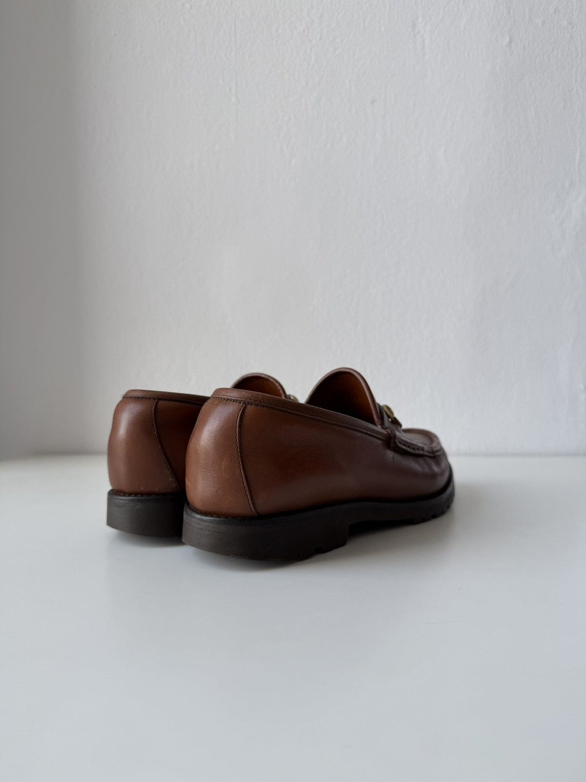 Gucci leather horsebit loafers on a thick notched sole