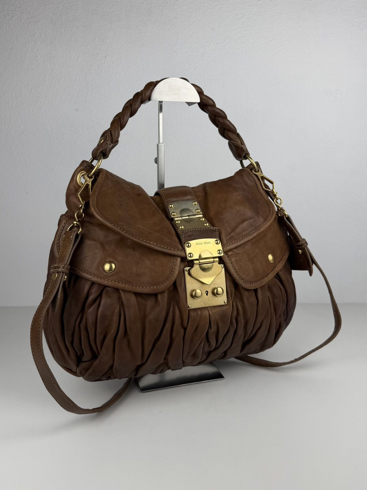Miu Miu matelasse pleated leather coffer bag in brown
