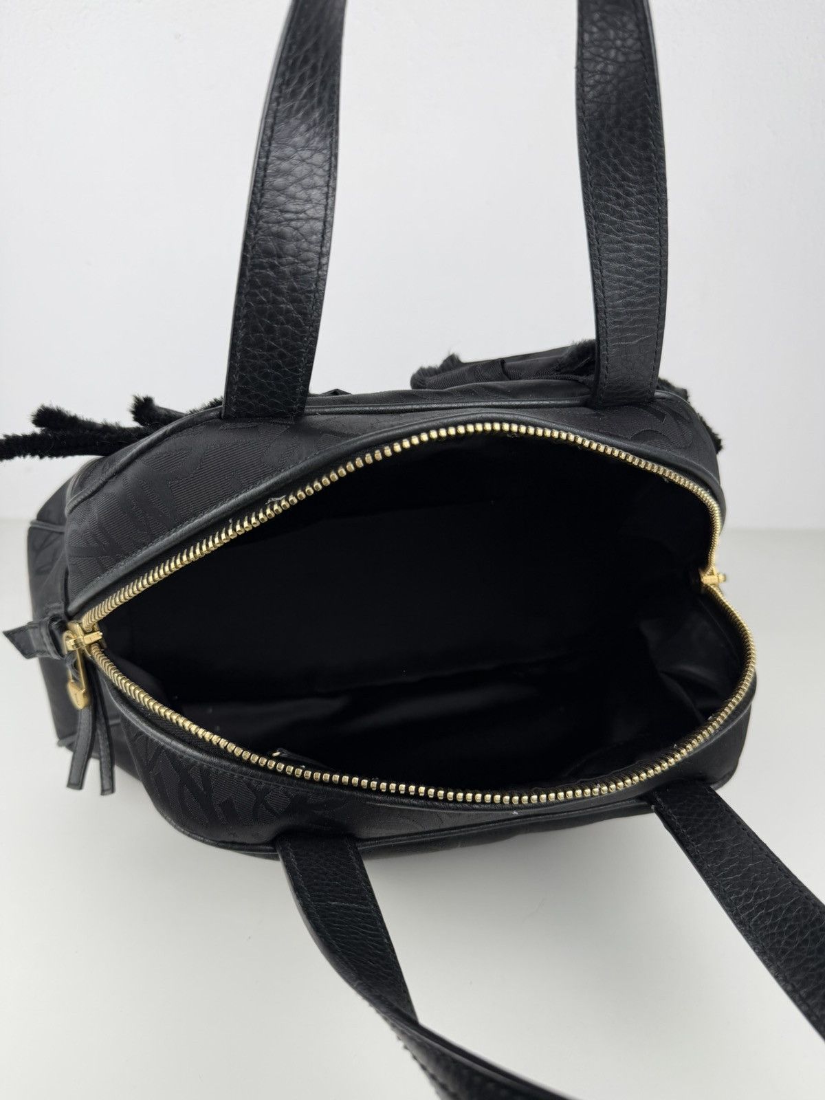 YSL Rive Gauche monogram obi bow bowler bag
