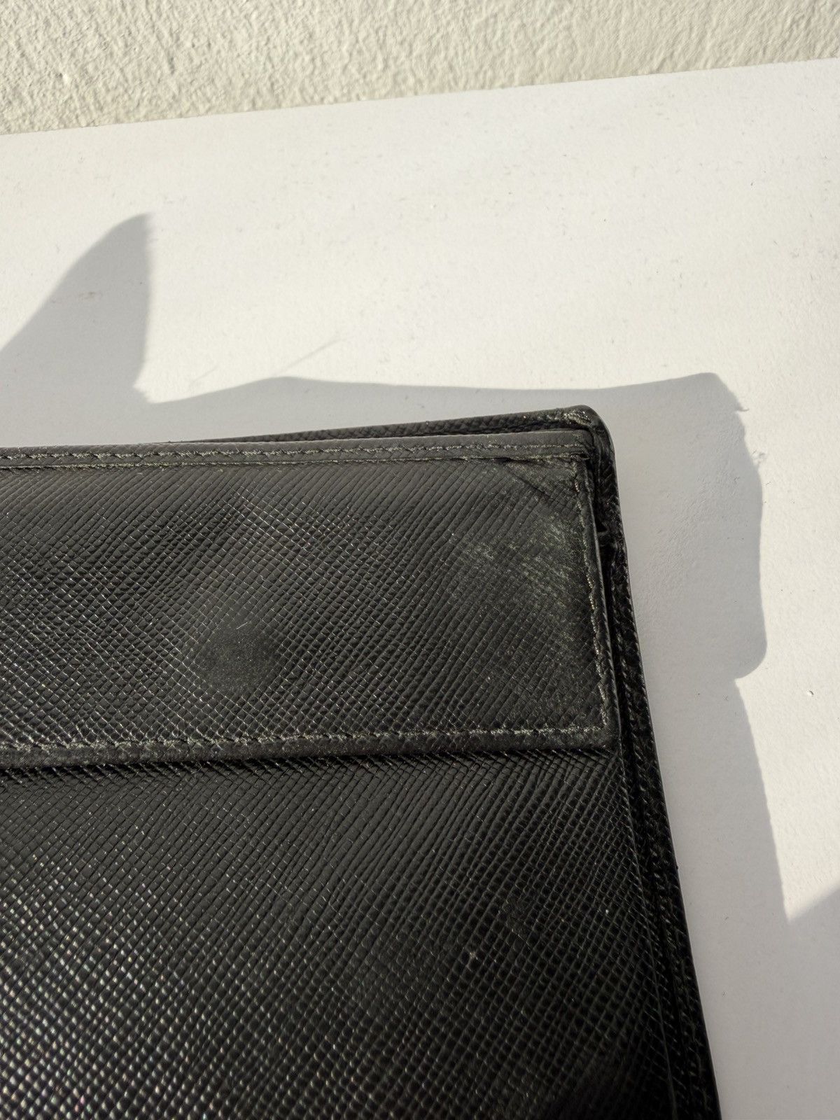 Prada saffiano leather bifold wallet