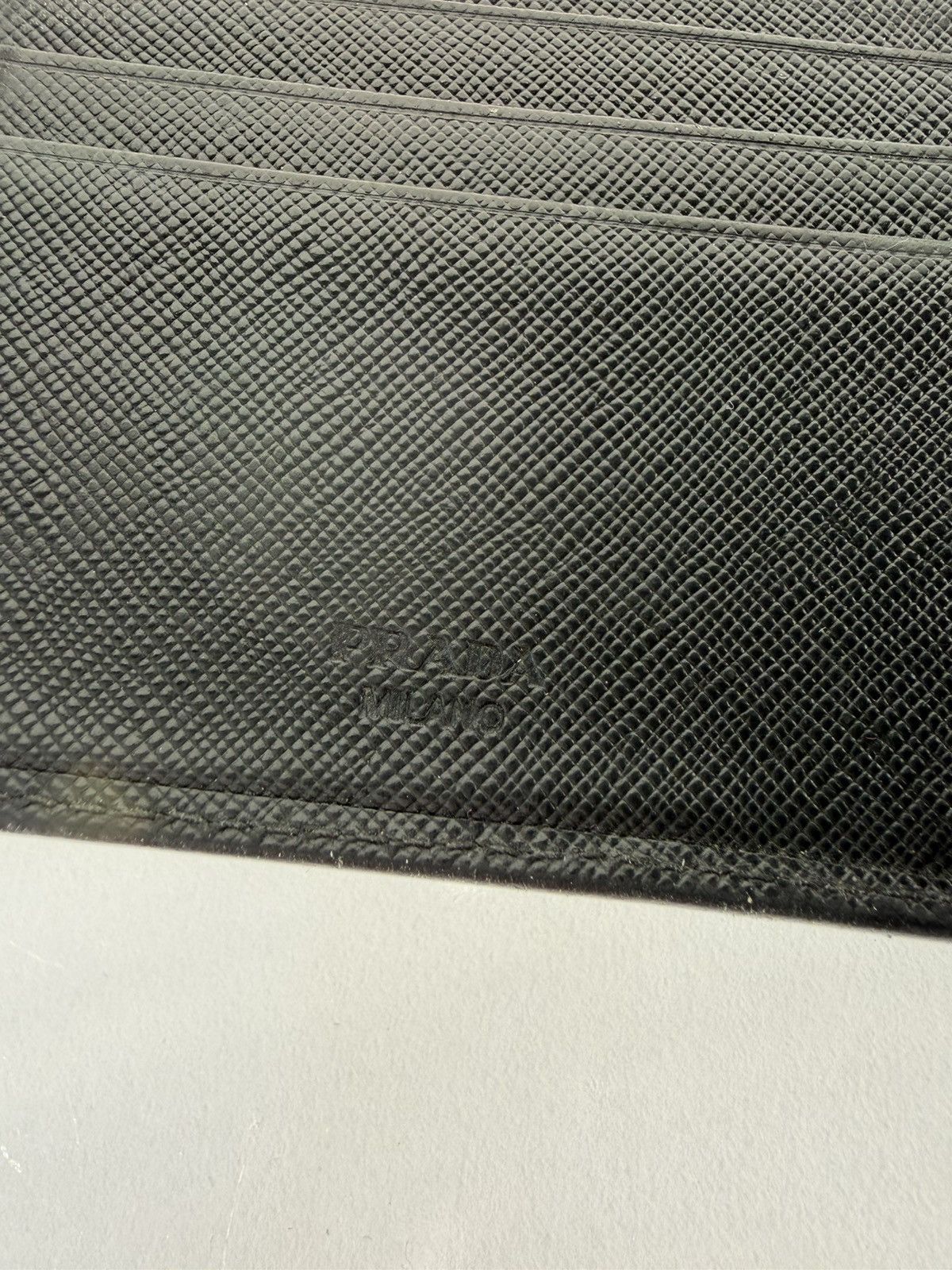 Prada saffiano leather bifold wallet