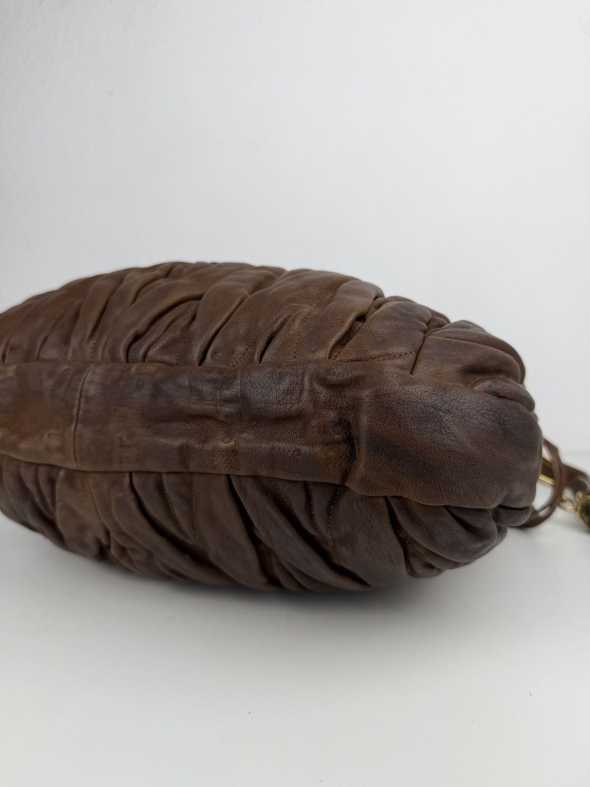 Miu Miu matelasse pleated leather coffer bag in brown