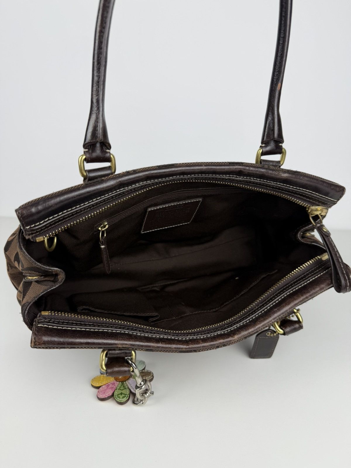 Coach hamptons carryall signature tote with flower charm