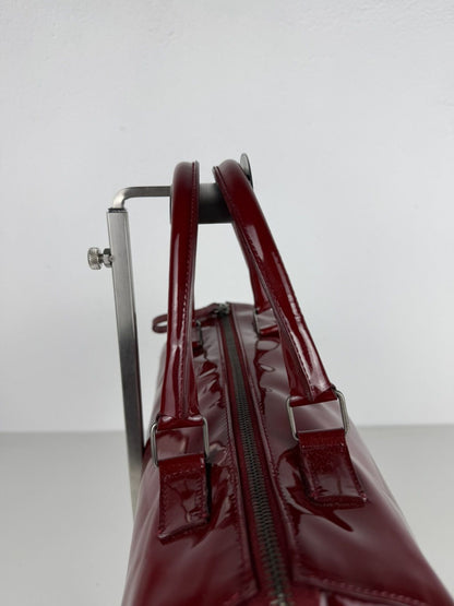 Vintage 90s Miu Miu patent leather cylindrical handbag