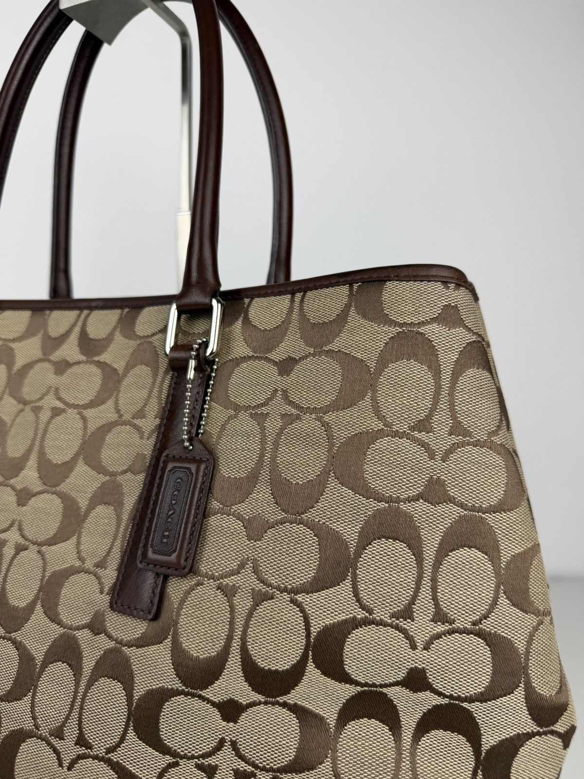 Coach signature leather and canvas tote bag
