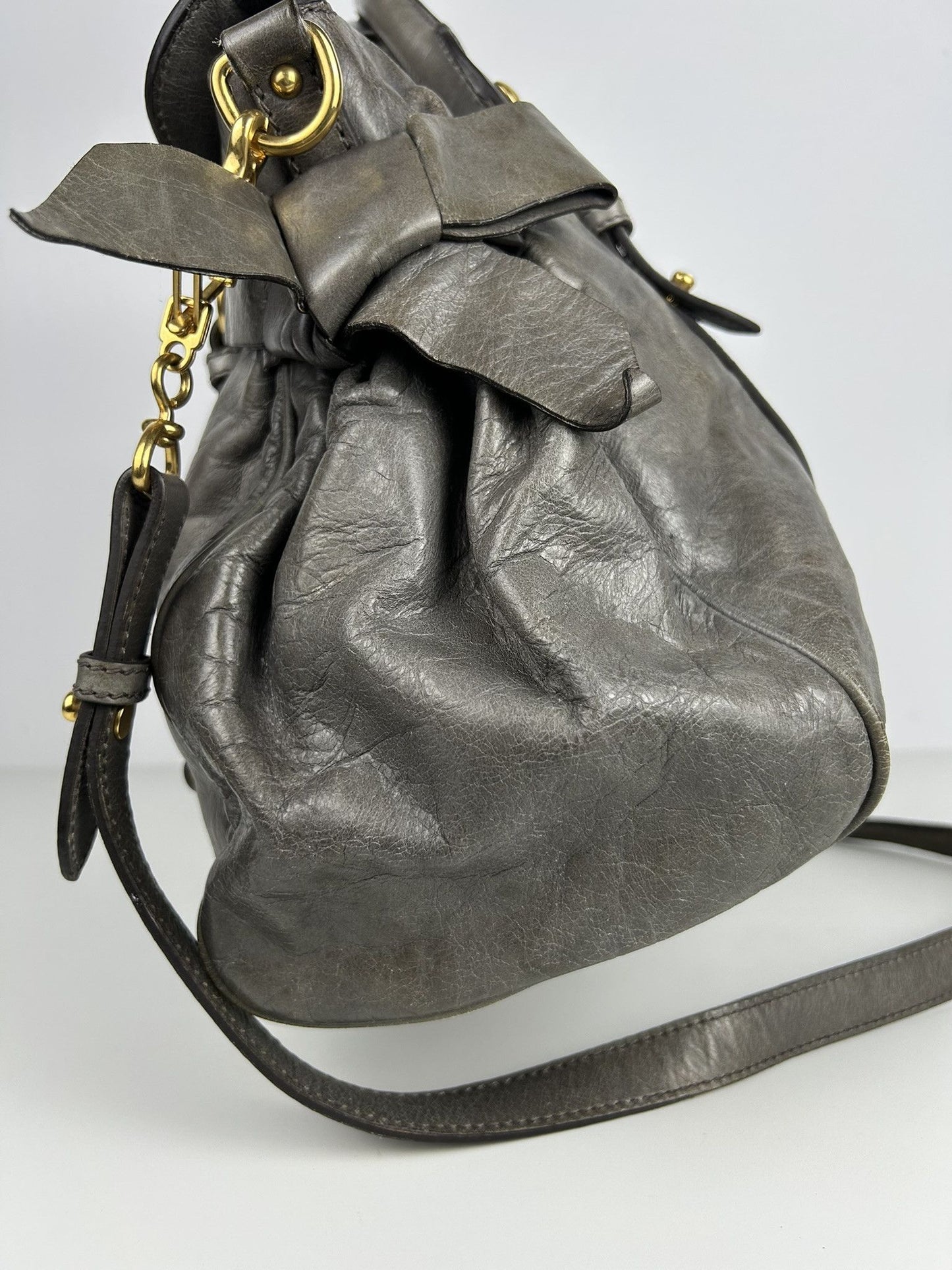Miu miu vitello bow bag in gray with locket