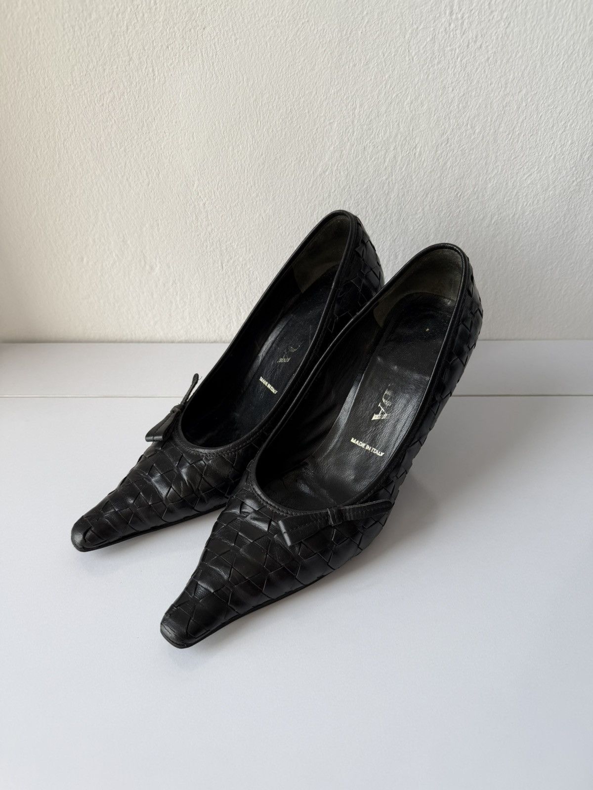 Prada woven leather long toe pumps with bow