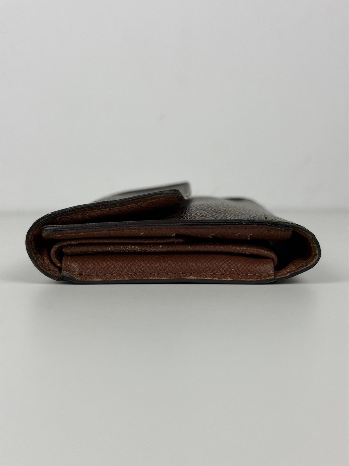 Louis Vuitton porto tresor international trifold wallet