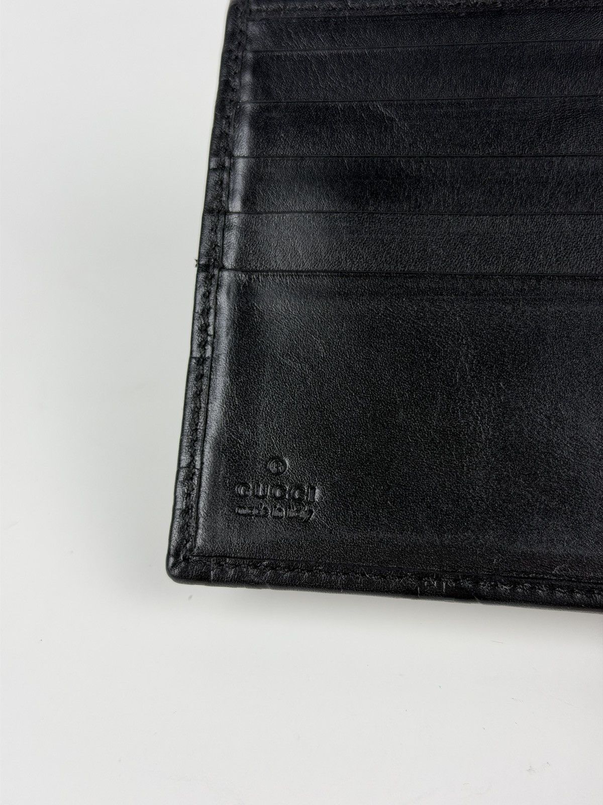 Gucci guccissima leather trifold wallet