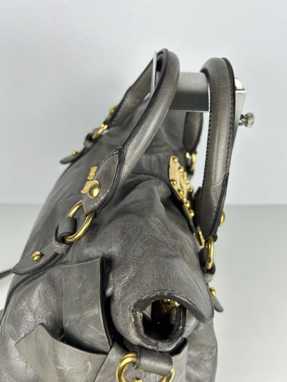 Miu miu vitello bow bag in gray with locket