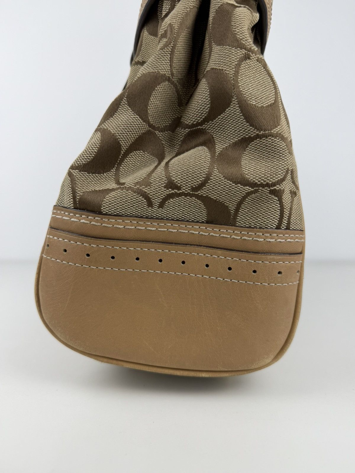Coach signature leather canvas tassel tote bag