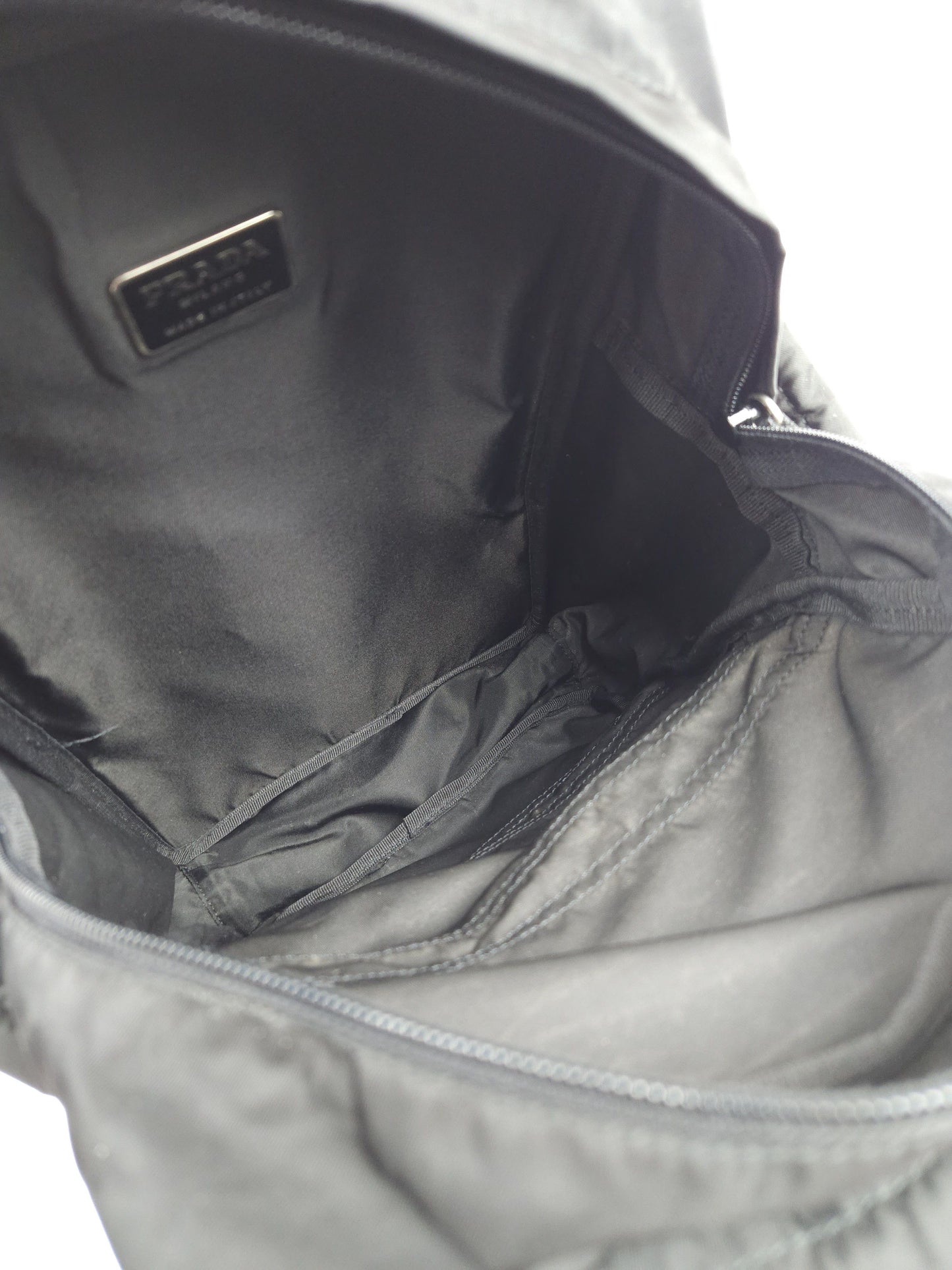 Prada triangle logo nylon multipocket backpack