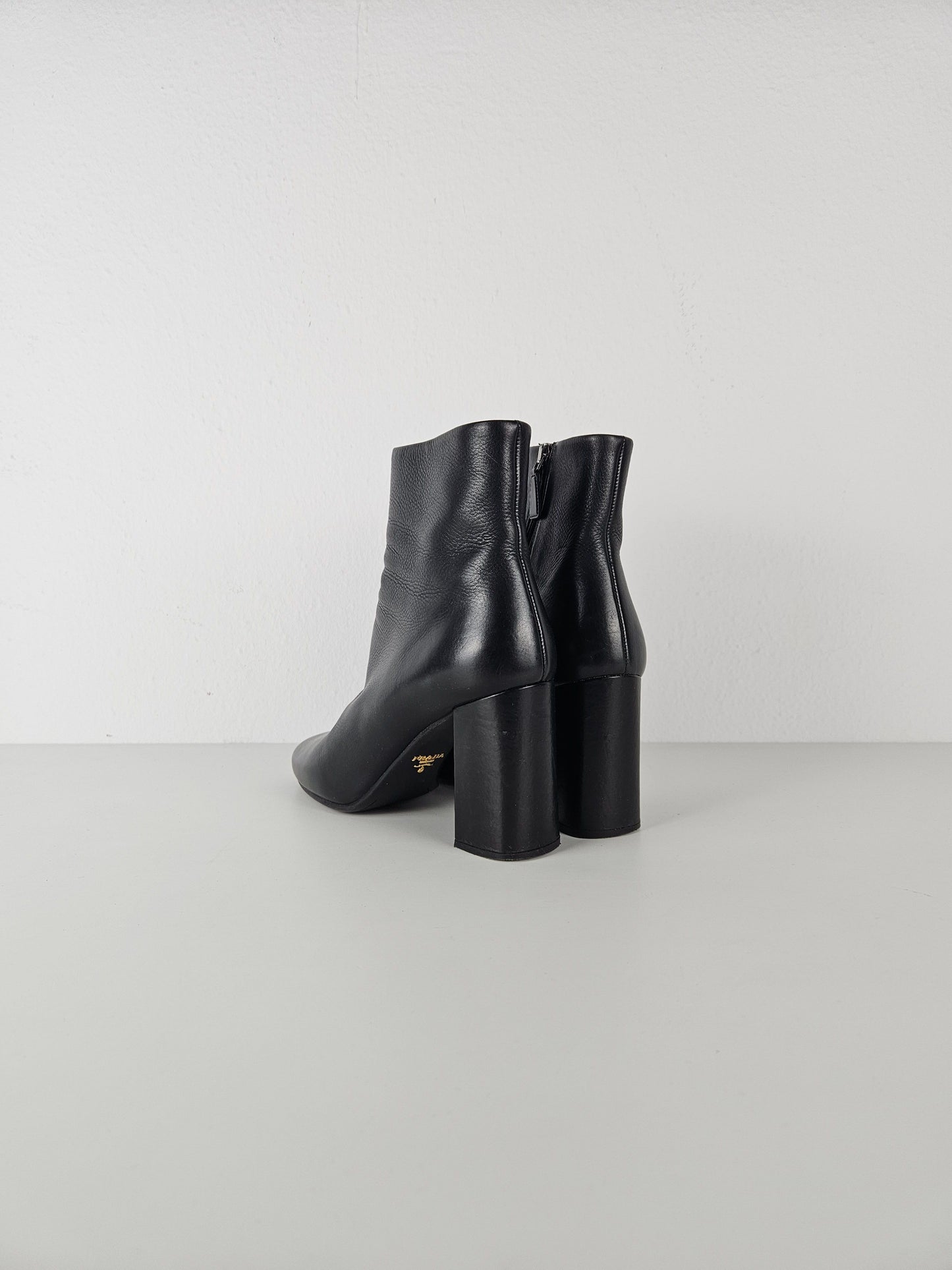 Prada calf leather side zip block heel ankle boots