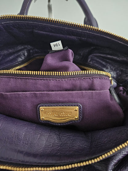 Miu miu vitello bow bag in deep purple