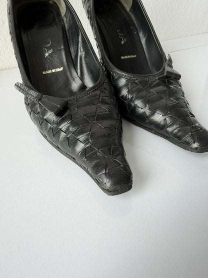 Prada woven leather long toe pumps with bow