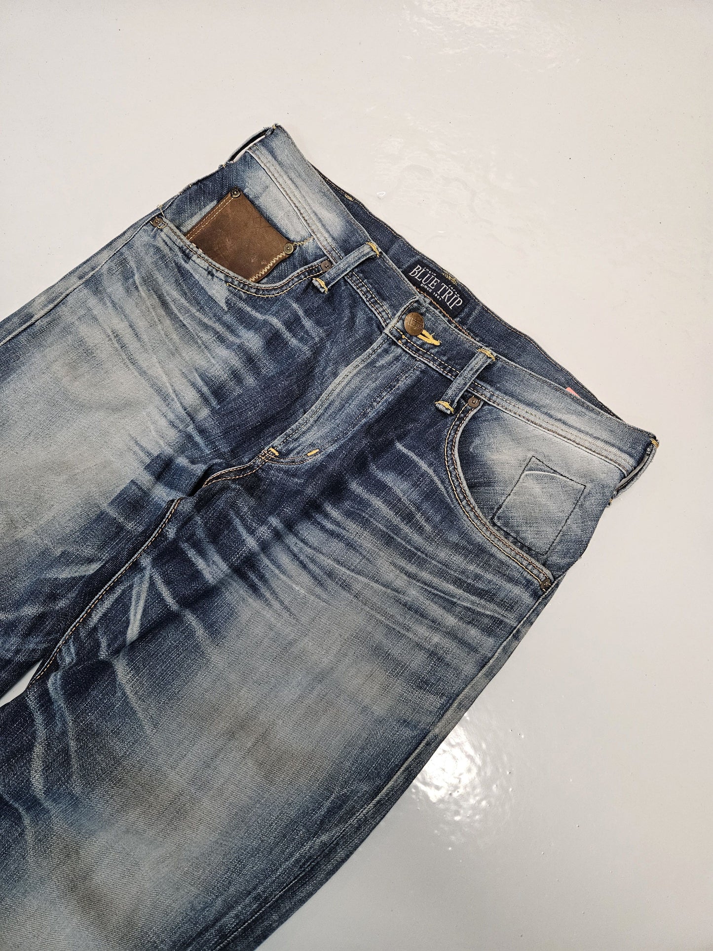 Edwin blue trip distressed washed bootcut denim