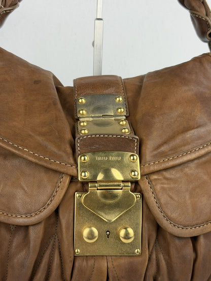 Miu Miu matelasse pleated leather coffer bag in brown