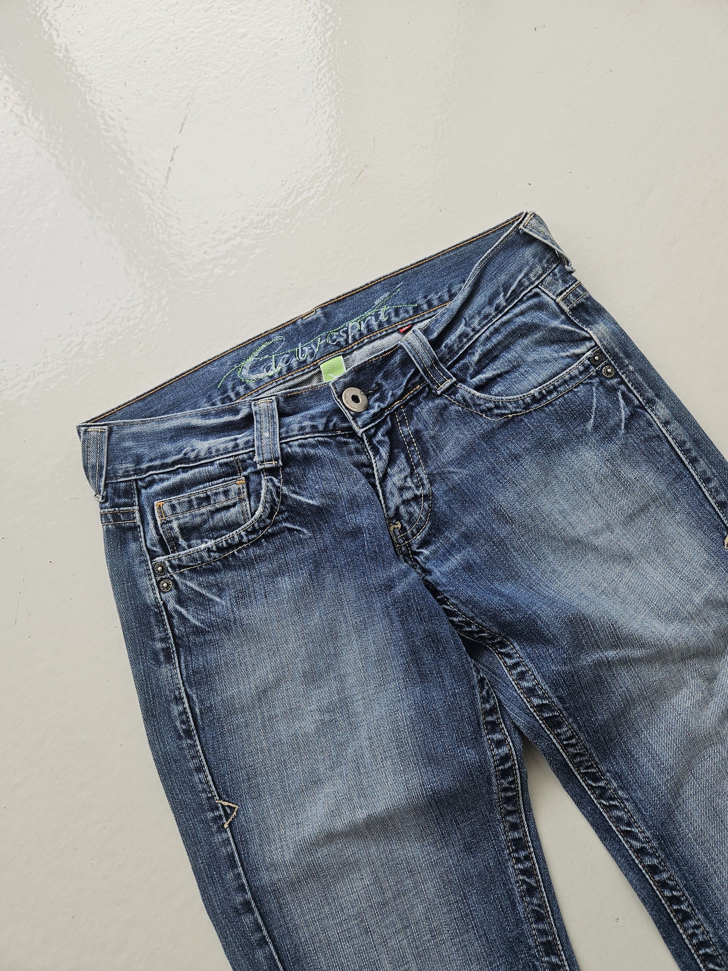 Vintage distressed bootcut low waisted denim