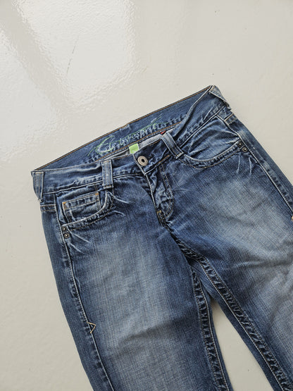 Vintage distressed bootcut low waisted denim