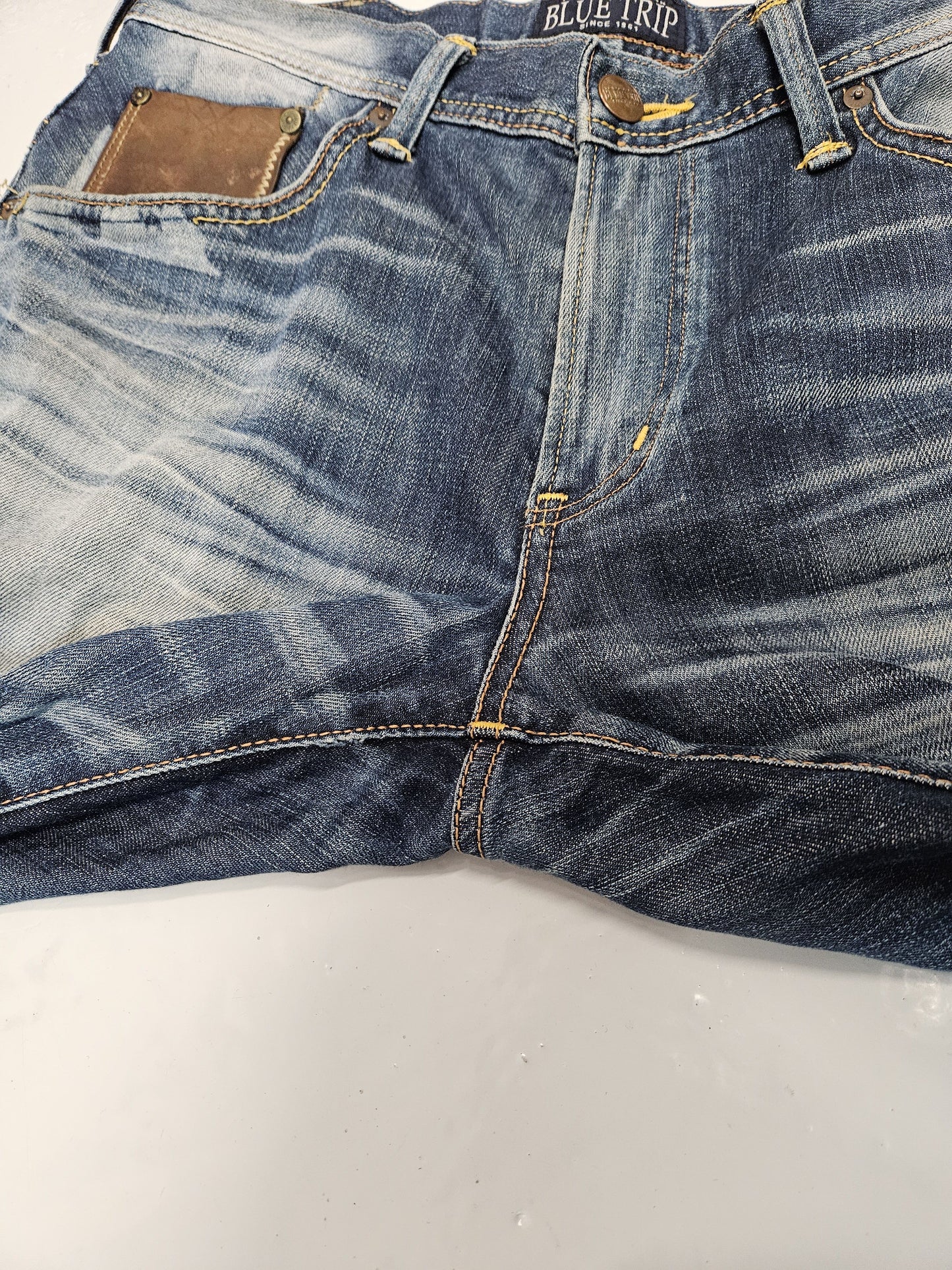 Edwin blue trip distressed washed bootcut denim