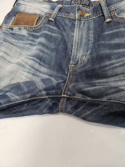 Edwin blue trip distressed washed bootcut denim
