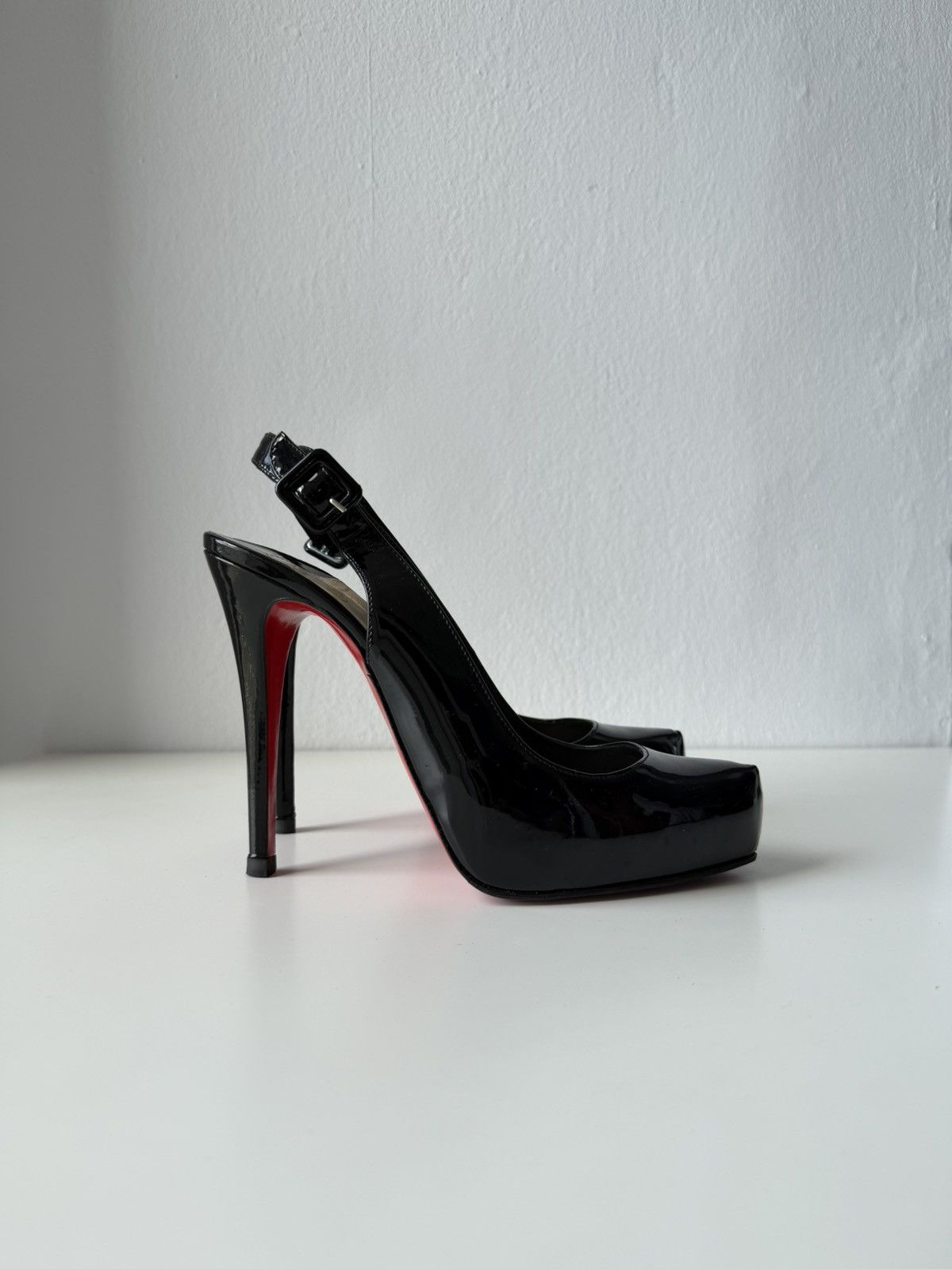 Christian Louboutin Rolande patent leather slingback pumps