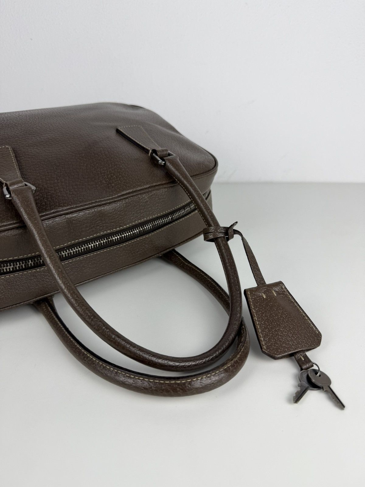 Prada saffiano leather triangle logo mini bowling bag