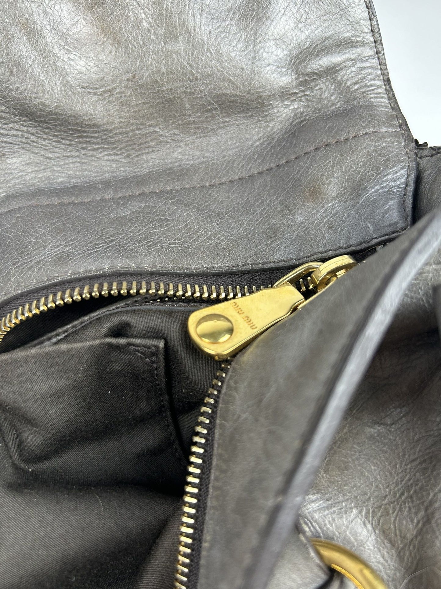 Miu miu vitello bow bag in gray with locket