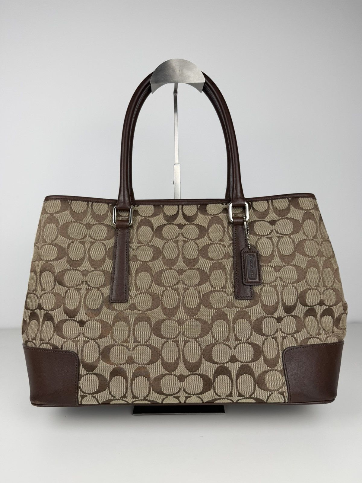 Coach signature leather and canvas tote bag