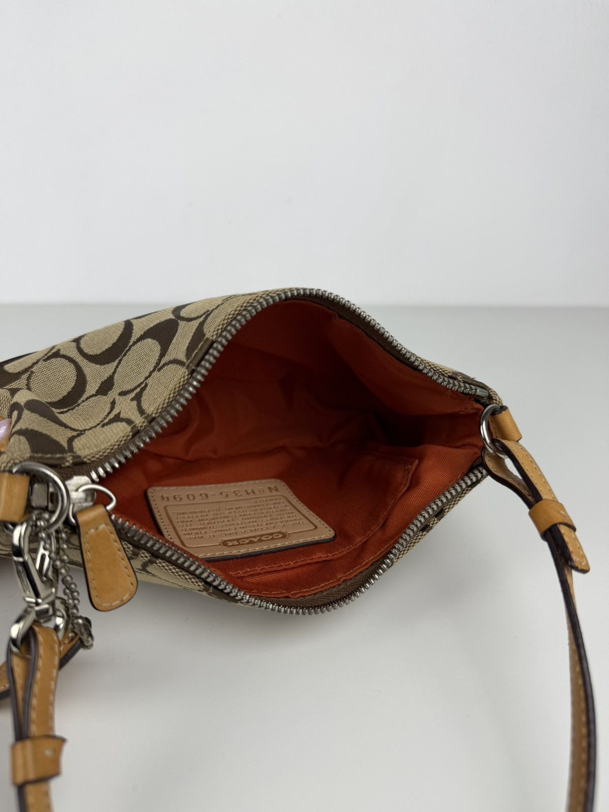 Coach signature demi mini pouch
