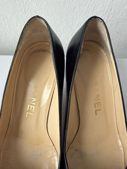 AW2001 Chanel embossed logo long toe leather pumps