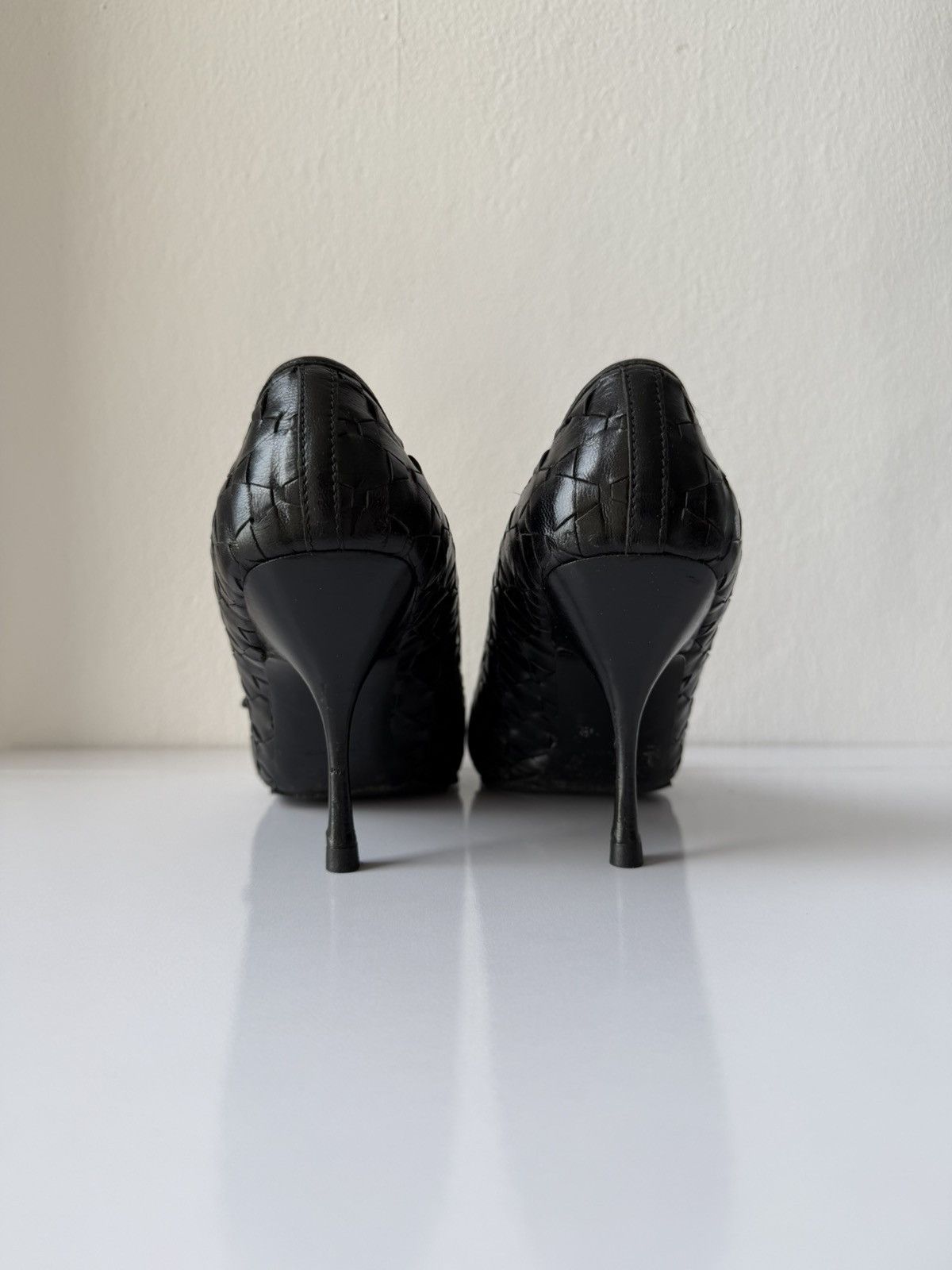 Prada woven leather long toe pumps with bow