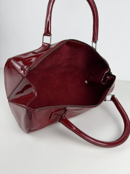 Vintage 90s Miu Miu patent leather cylindrical handbag